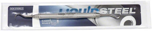 Implantatreiniger LiquidSteel® Scaler in Verpackung mit gebogenem Edelstahlgriff.