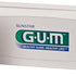 GUM TRAV-LER Interdentalbürsten in orange mit Verpackung und Produktlogo.