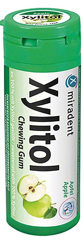 Miradent Xylitol Kinderkaugummi Apfel in grüner Verpackung.