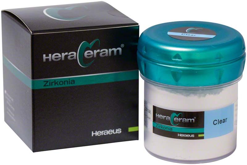HeraCeram® Zirkonia Transpa 100g Dose mit Verpackung im Hintergrund.