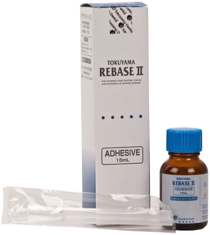 Rebase II Fast Adhesive 15 ml Flasche mit Verpackung und Applikator.