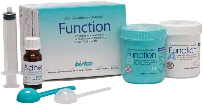 Additionsvernetzendes A-Silikon Abformmaterial "Function" mit Zubehör auf weißem Hintergrund.