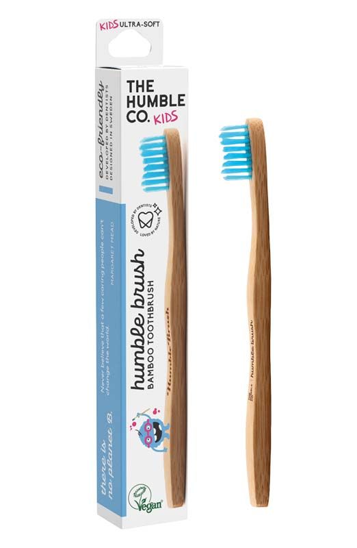 Humble Brush Kinder Zahnbürste mit blauen Borsten und Bambusgriff in Verpackung.