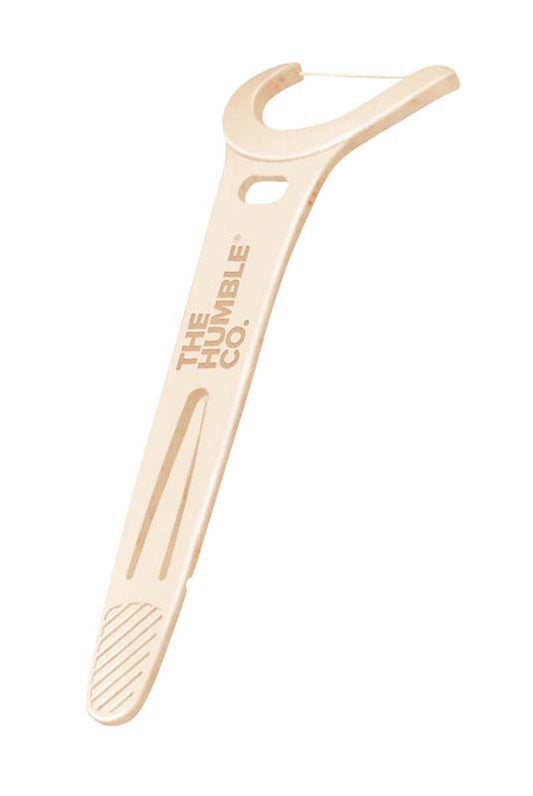 Humble Floss Pick mit ergonomischem Griff und Zahnseidenfaden.