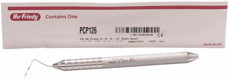 Parodontometer CP12 mit Griff 6 vor Verpackung auf weißem Hintergrund.