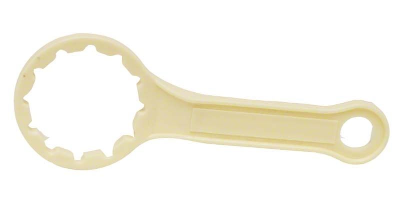 Cubitainerschlüssel aus beigem Kunststoff mit rundem Griff.