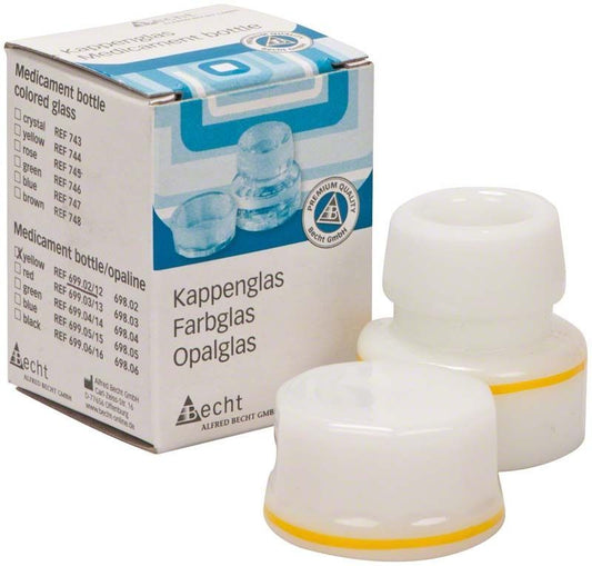 Kappenglas Opalglas mit gelbem Ring und Verpackung im Hintergrund.