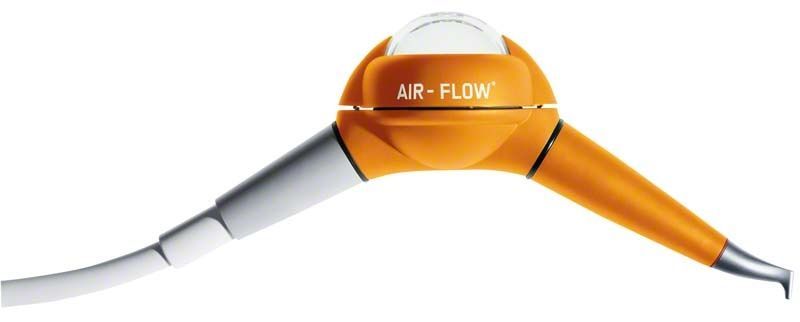 Oranges AIRFLOW® Pulverstrahlgerät für professionelle Zahnreinigung.