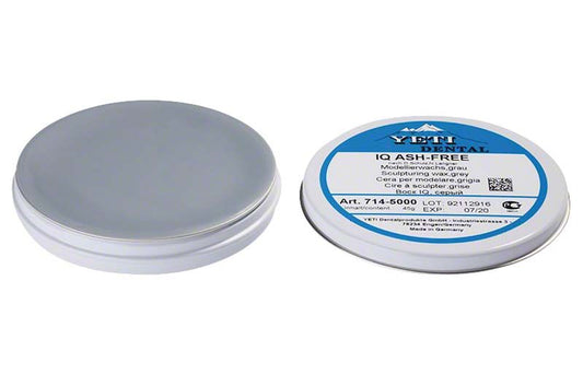 Modellierwachs IQ Modellierwachs grau in runder Metallverpackung.