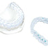 Transparente dental Schienen aus DURASOFT® pd Material auf weißem Hintergrund.