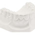Hartelastische transparente Duran Tiefziehfolie auf Zahnmodell für dentalmedizinische Anwendungen.