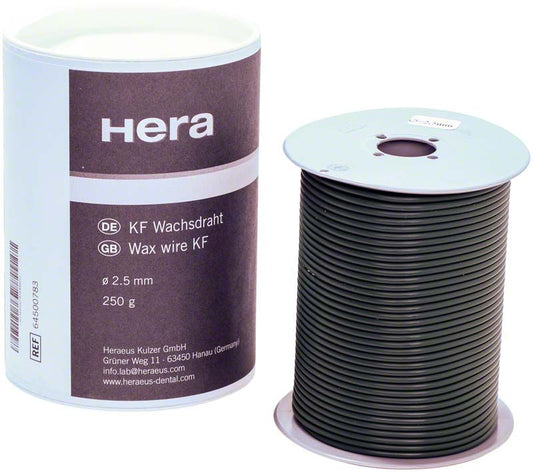 KF-Wachsdraht Ø 2,5 mm auf Spule neben Verpackung.