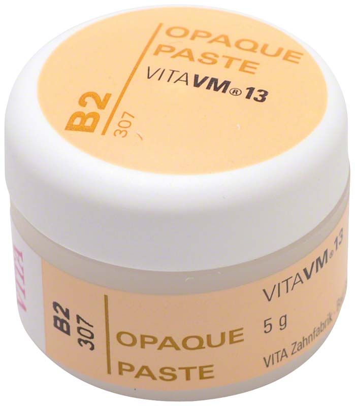 Weiße Dose mit Beschriftung "OPAQUE PASTE B2" und "VITA VM13".