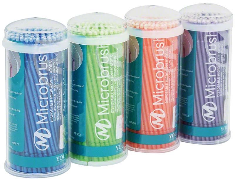 Bunte Microbrush Applikatoren in durchsichtigen Röhren für präzise dentalmedizinische Anwendungen.