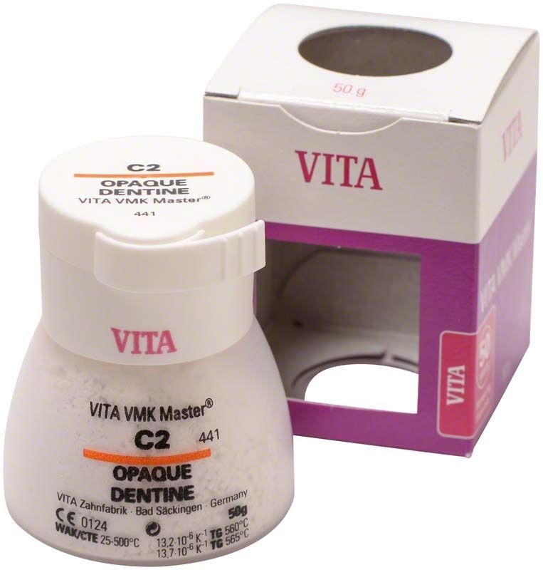 VMK Master Opaque Dentine C2 in weißer Verpackung mit violettem Akzent.