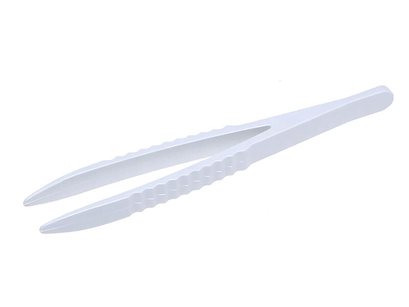 Sterile Einmalpinzette aus transparentem Polystyrol mit geriffeltem Griff.