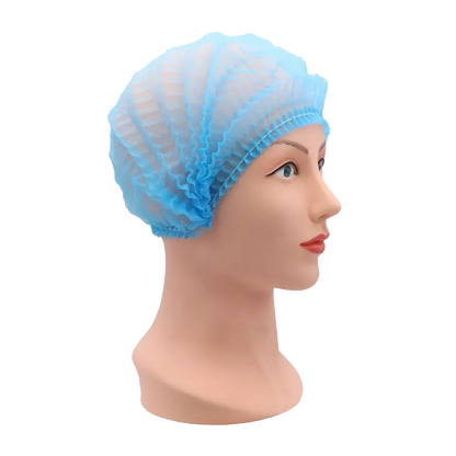 Leichte blaue PP Klipphaube aus Polypropylen-Spinnvlies auf Modellkopf.