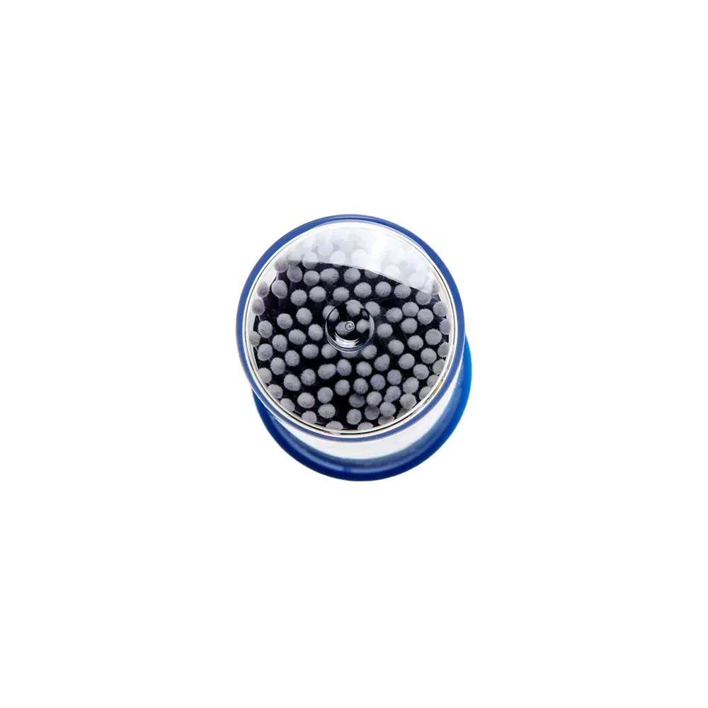 Lila Applikatoren, Normalgröße, in runder Plastikbox mit transparentem Deckel.