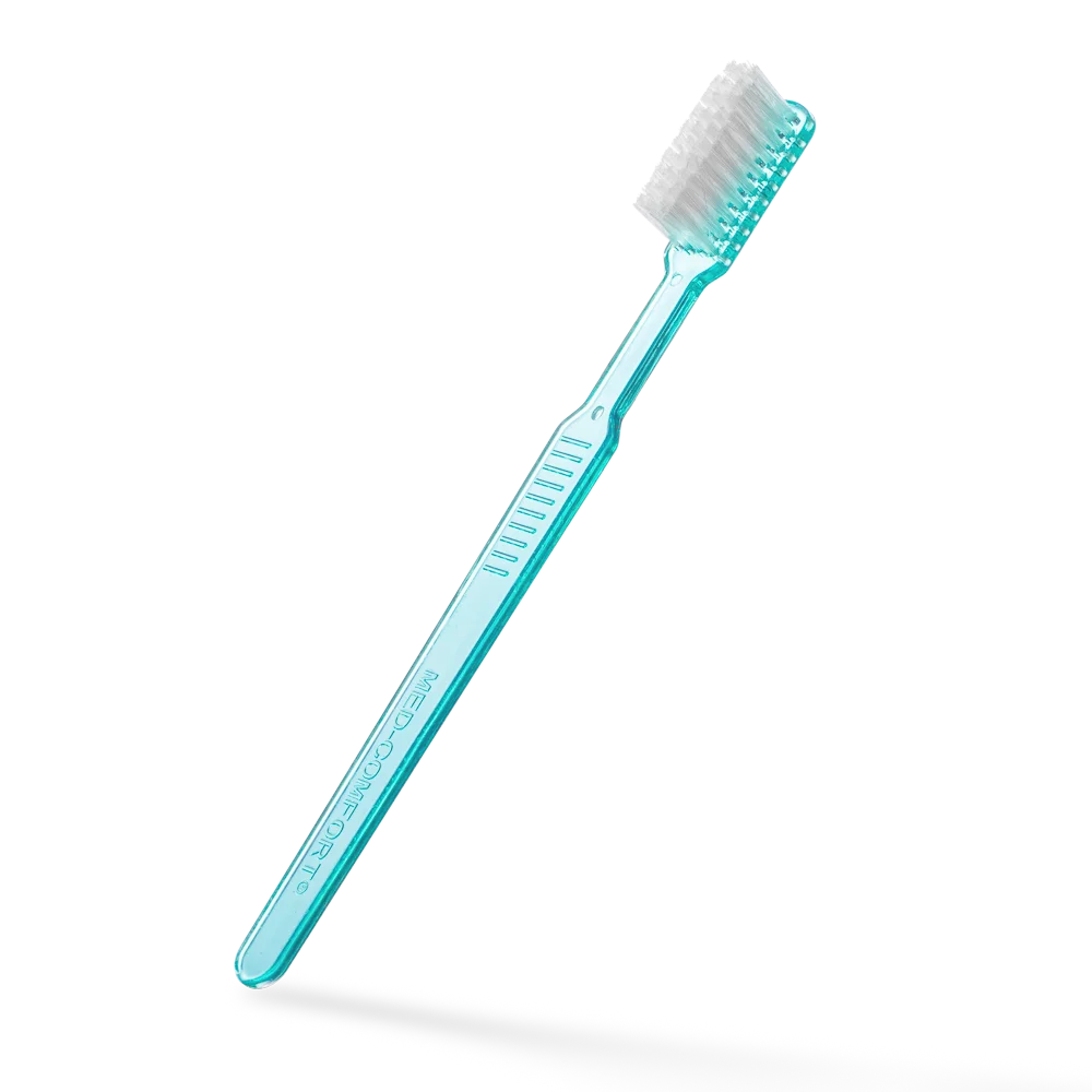 Einmalzahnbürste mit integrierter Zahnpasta, grün, aus Polystyrol, ca. 15 cm lang.