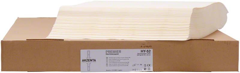Sterilisationspapier 40x40cm in Weiß, gestapelt auf Kartonverpackung.