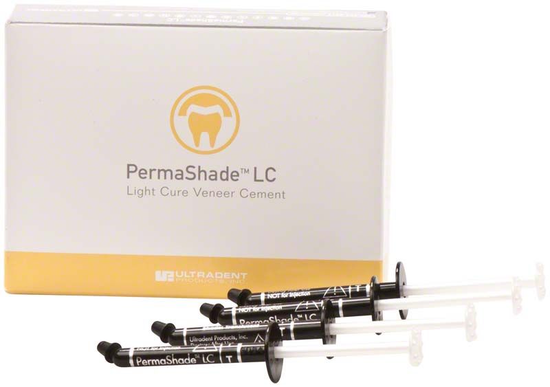 Permashade LC Veneer Cement mit drei schwarzen Spritzen vor Verpackung.