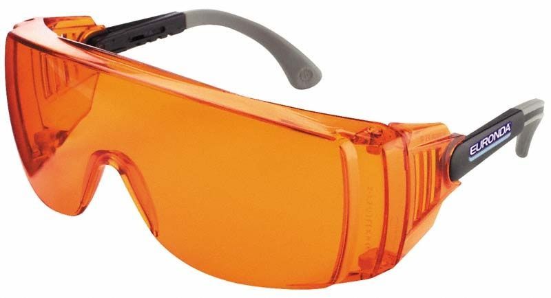 Monoart Schutzbrille in hellem Orange mit grauen Bügeln.