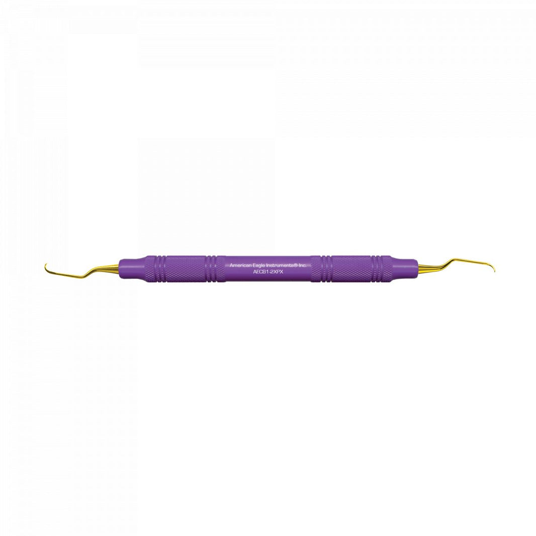 American Eagle XP Universalkürette Barnhart mit ergonomischem lila Handgriff und goldenen Spitzen.