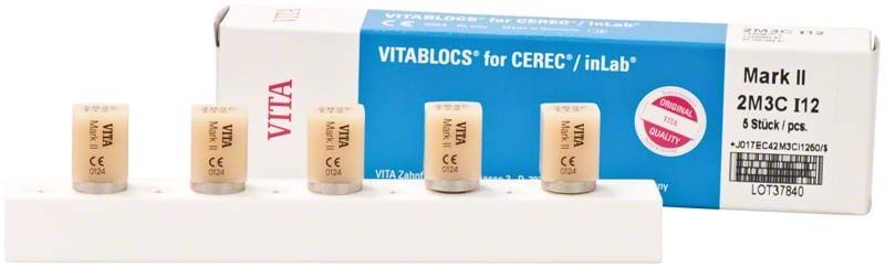 VITABLOCS® Mark II I12 Dentalrohlinge auf weißem Halter vor Verpackung.