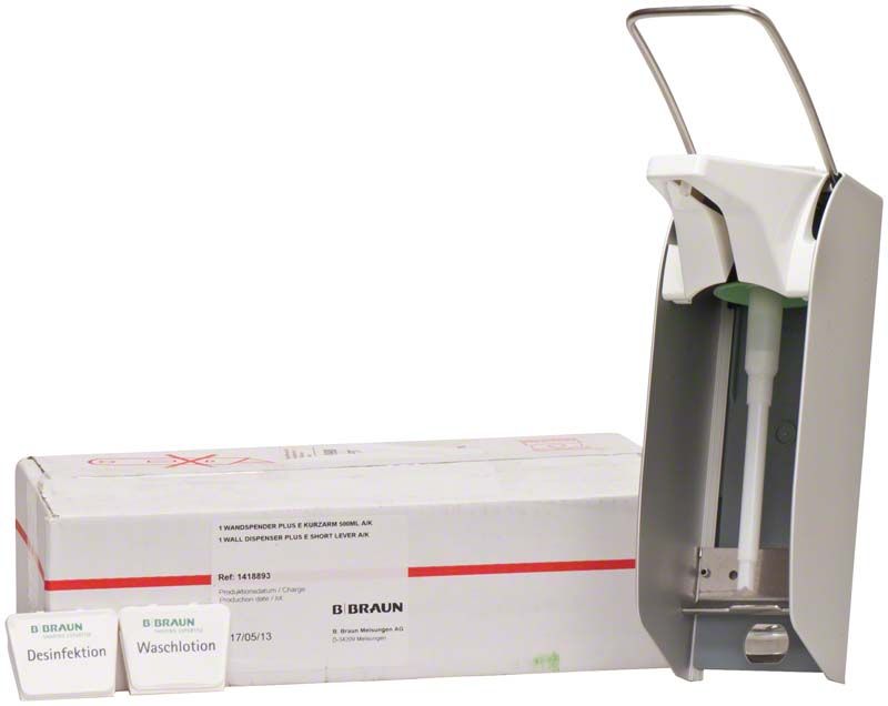 Händedesinfektionsspender mit Armhebel aus Aluminium neben Verpackung.