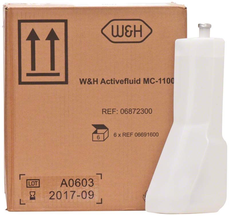 Kartonverpackung mit W&H Activefluid MC-1100 und einer weißen Flüssigkeitsflasche.