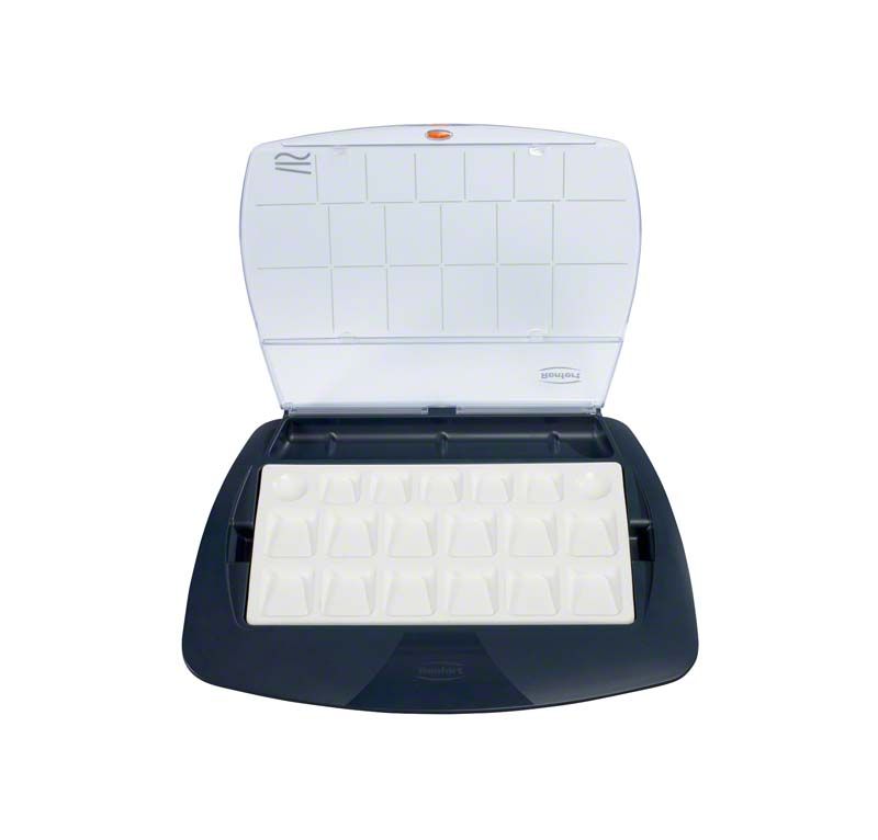 Offene Verpackung der lay:art tropic pro XL mit weißen Einsätzen.