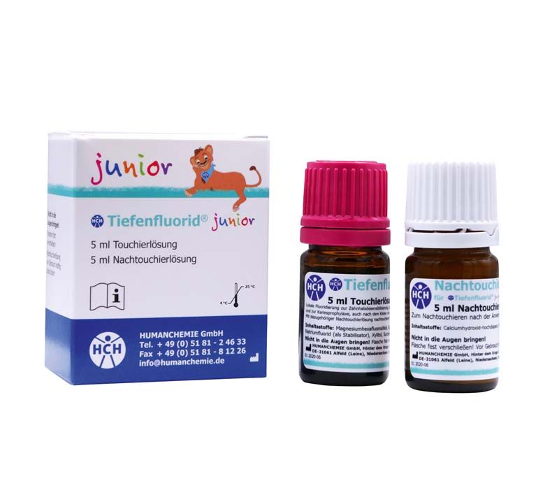 Tiefenfluorid junior Flaschen und Verpackung mit bunten Verschlüssen.