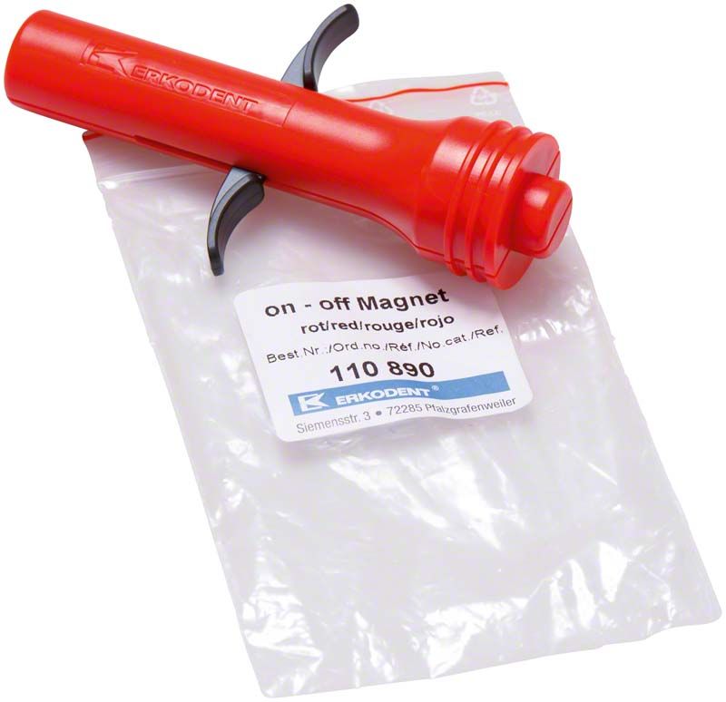 Roter On-Off Magnet für Dentalgranulat auf transparentem Beutel.