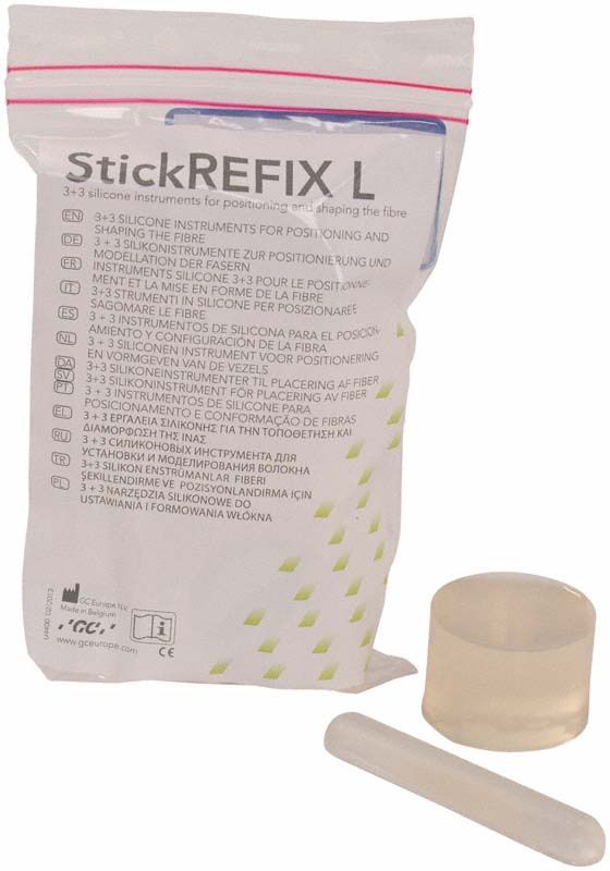 StickREFIX L Silikoninstrumente-Set mit Verpackung und zwei Silikonteilen.