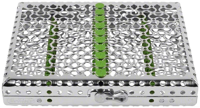 Kassette aus Edelstahl mit grünen Silikoneinsätzen für chirurgische Instrumente.