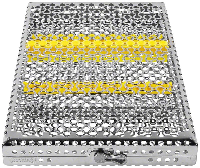 Metallische Instrumentenkassette mit gelben Elementen für 13 Instrumente.