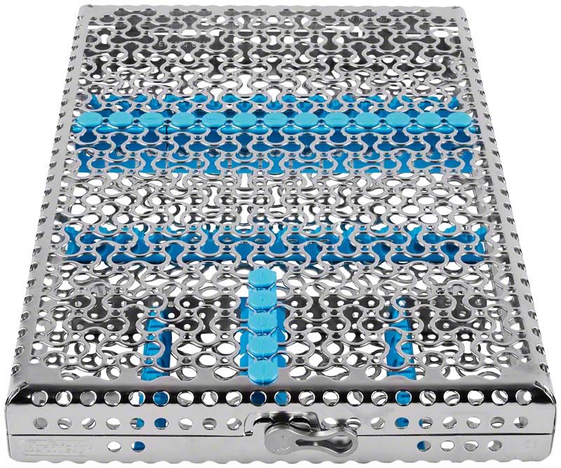 Metallische Instrumentenkassette mit türkisfarbenen Akzenten für 18 Instrumente.