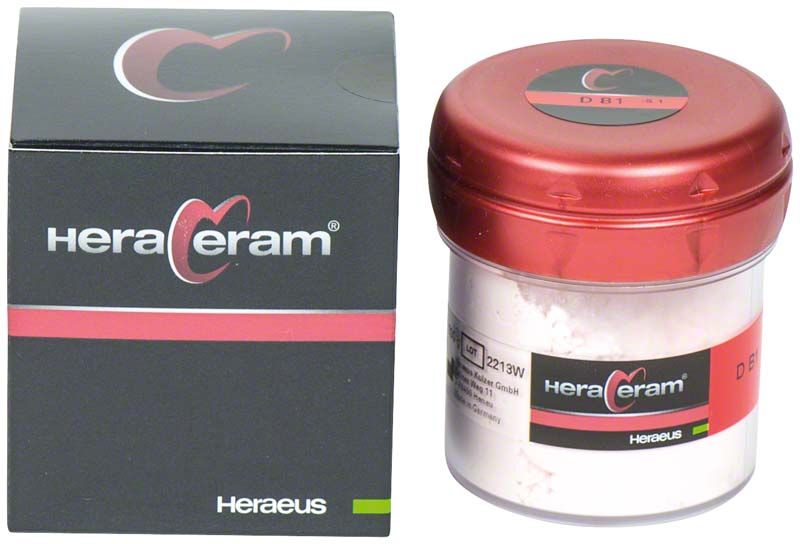 HeraCeram® Dentin 100g DB1 in rotem Behälter neben schwarzer Verpackung.