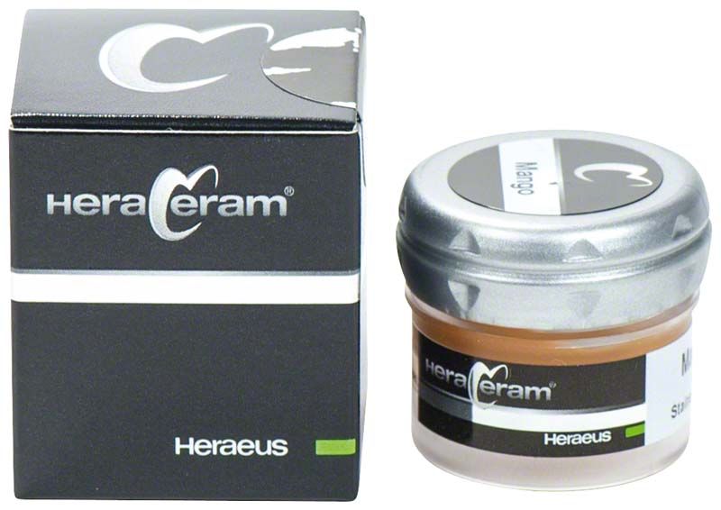 HeraCeram® Stains universal Paste Mango in schwarzer Verpackung und kleinem Glasbehälter