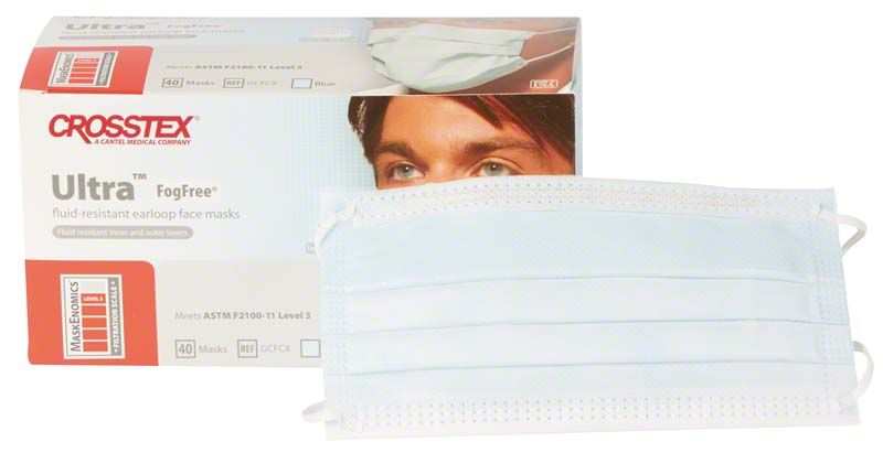 Blauer ULTRA Mundschutz Fogfree vor der Produktverpackung mit Aufdruck.