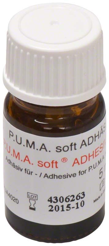 P.U.M.A. soft ADHESIVE Fläschchen mit weißem Schraubverschluss.