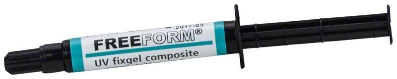 Freeform fixgel Composite-Spritze mit schwarzem Kolben und blauem Etikett.