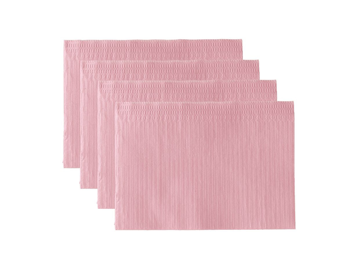 Monoart Patientenservietten Towel UP rosa, gestapelt in vier Schichten.