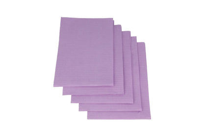 Lila Monoart Patientenservietten in gestapelter Anordnung.