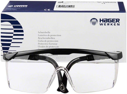 Schutzbrille H&W Logic mit längenverstellbaren Seitenbügeln vor Verpackung.