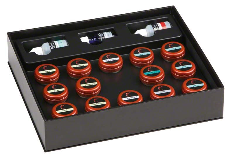 HeraCeram® Enhancer-Set mit mehreren Farbpulvern in einem schwarzen Karton.