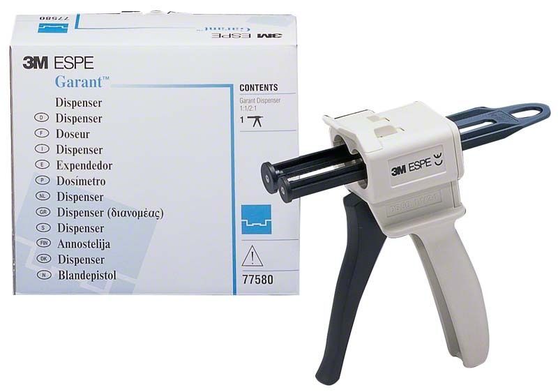 3M Garant™ Dispenser 1:1 / 2:1 mit Verpackung im Hintergrund.