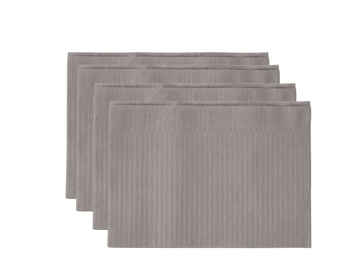 Monoart Patientenservietten Towel UP platin, gestapelt, Detailansicht der Textur.