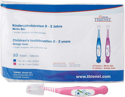 Kinderzahnbürste in Pink mit Bärenmotiv und Schutzkappe, Verpackung sichtbar.