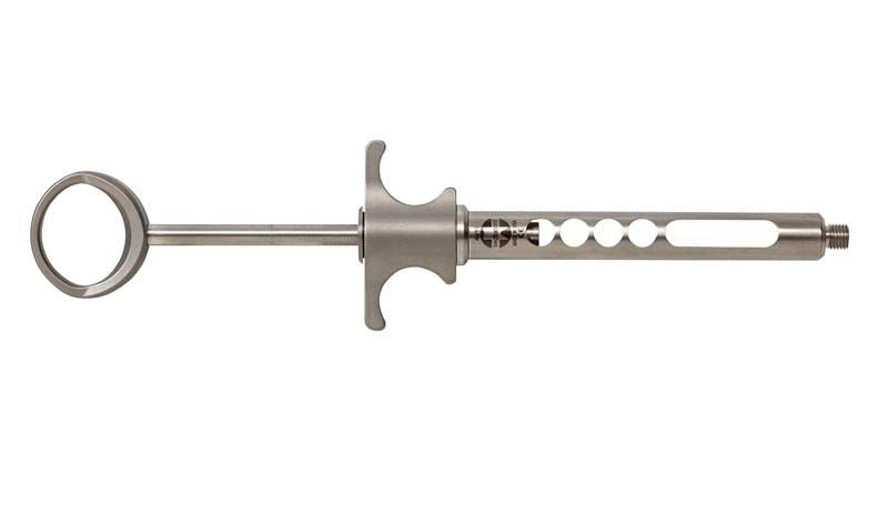 Selbstaspirierende Edelstahlspritze mit kleinem Daumenring, seitliche Ansicht.